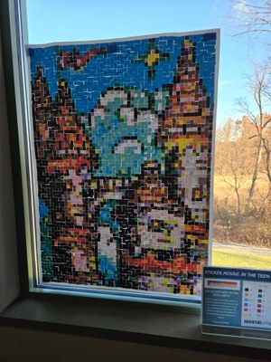 A mosaic of stickers that forms a castle